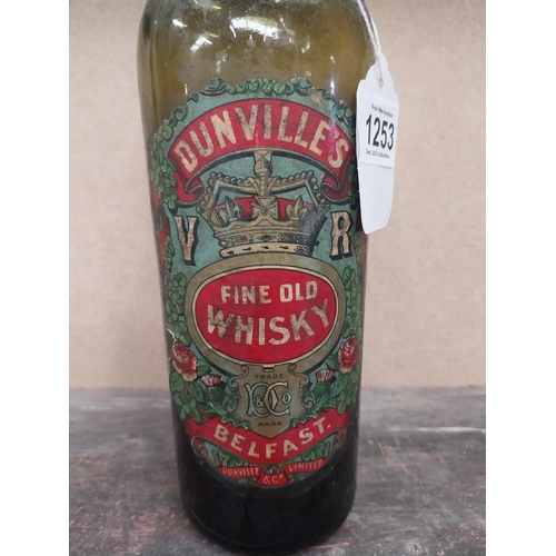 1253 - Bottle of Dunvilles V R Old Irish Whiskey. (partial contents}