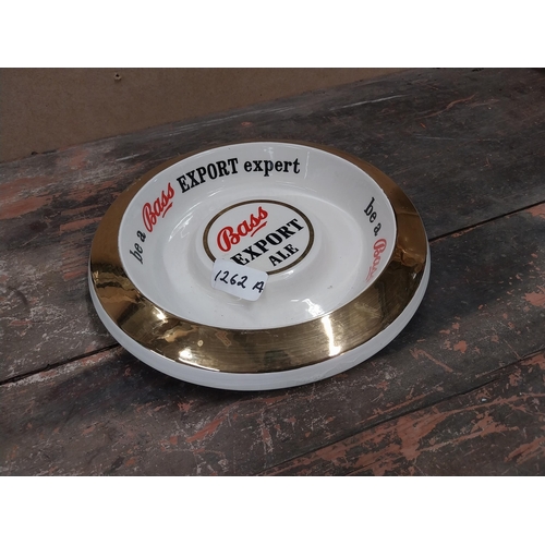 1262A - Be a Bass Expert Wade ceramic advertising ashtray. {4 cm H x 24 cm Dia.}.