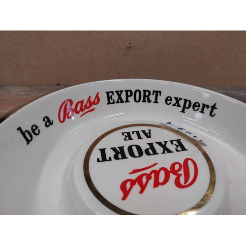 1262A - Be a Bass Expert Wade ceramic advertising ashtray. {4 cm H x 24 cm Dia.}.