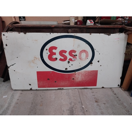 1267 - Esso enamel advertising sign. {68 cm H x 133 cm W}.