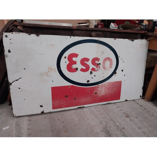 1267 - Esso enamel advertising sign. {68 cm H x 133 cm W}.