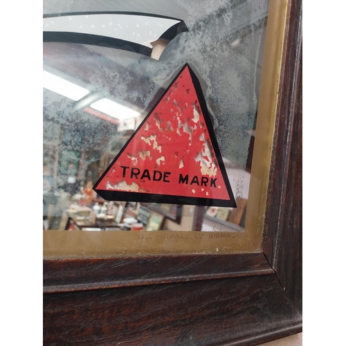 1273 - Bass Great Stuff mirror in original stamped frame. {46 cm H x 56 cm W}.