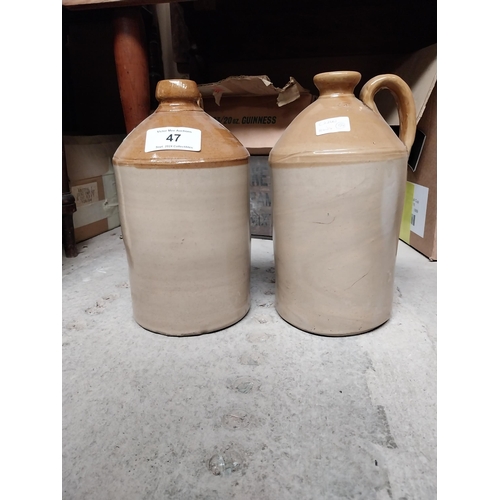 47 - Two 19th C. stoneware flagons. {31 cm H x 17 cm Diam.}.