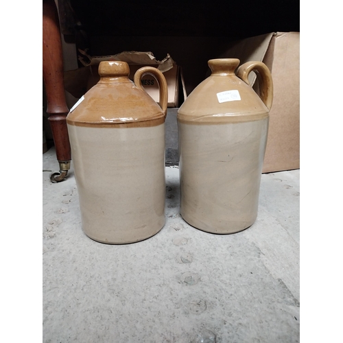 47 - Two 19th C. stoneware flagons. {31 cm H x 17 cm Diam.}.