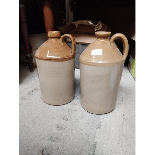 47 - Two 19th C. stoneware flagons. {31 cm H x 17 cm Diam.}.