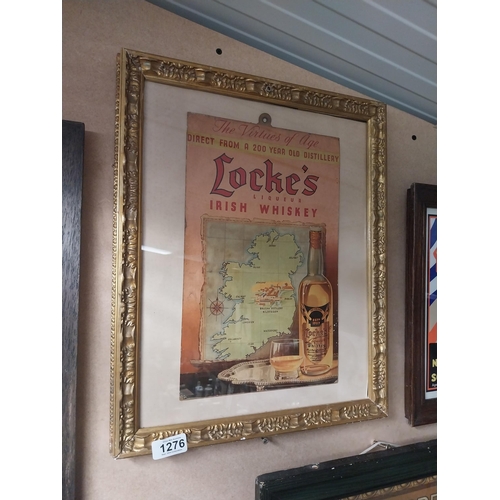 1276 - Locke's Irish Whiskey framed showcard. {45 cm H x 37 cm W}.