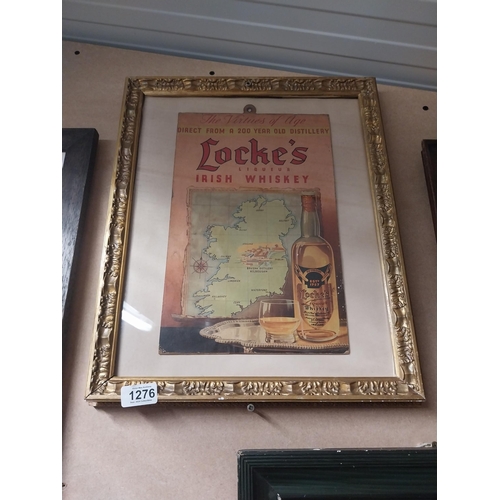 1276 - Locke's Irish Whiskey framed showcard. {45 cm H x 37 cm W}.