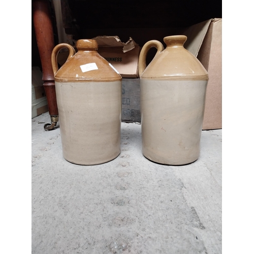 47 - Two 19th C. stoneware flagons. {31 cm H x 17 cm Diam.}.