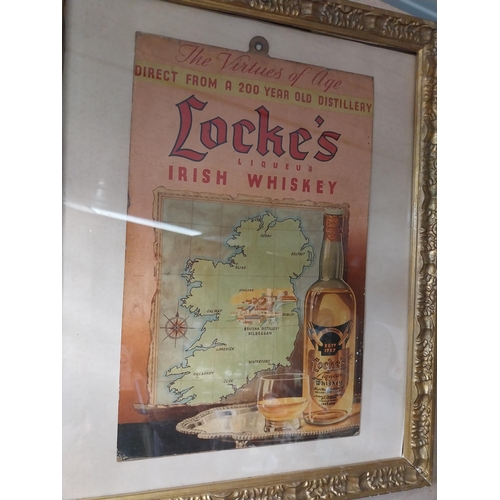 1276 - Locke's Irish Whiskey framed showcard. {45 cm H x 37 cm W}.