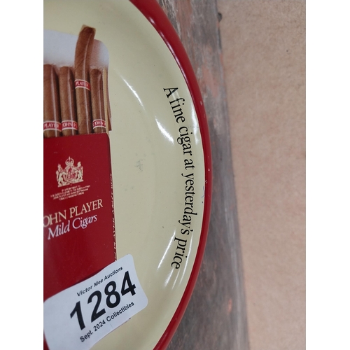 1284 - Glass Wills's Capstan ashtray {4 cm H x 12 cm Dia.} and Player's Mild Cigars ashtray {3 cm H x 15 cm... 