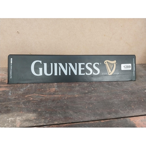 1289 - Three Guinness counter signs. {9 cm H x 45 cm W}.