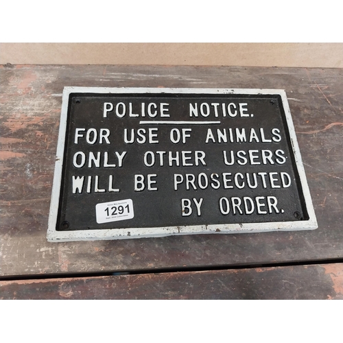 1291 - Cast iron Police Notice sign. {18 cm H x 29 cm W}.