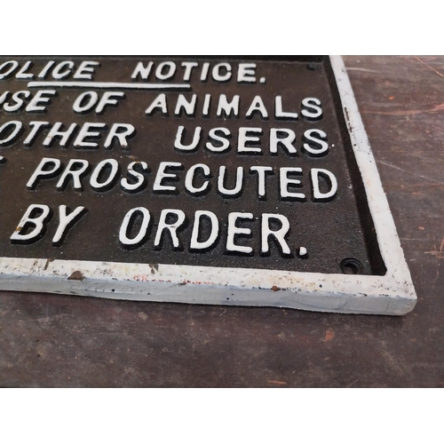 1291 - Cast iron Police Notice sign. {18 cm H x 29 cm W}.