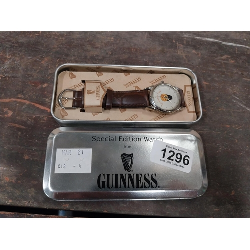 1296 - Guinness advertising watch in tin presentation case.