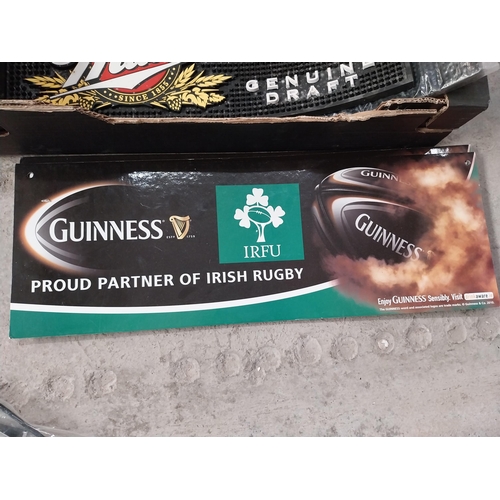 1297 - Box of Guinness memorabilia - showcards, banners etc and optic in box.