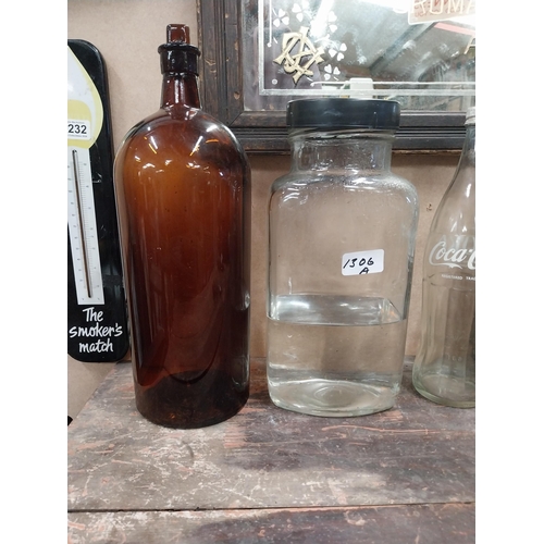 1306A - Miscellaneous lot of glass sweet jars, four chemist bottles, Coca Cola bottle and tobacco cutter. {2... 