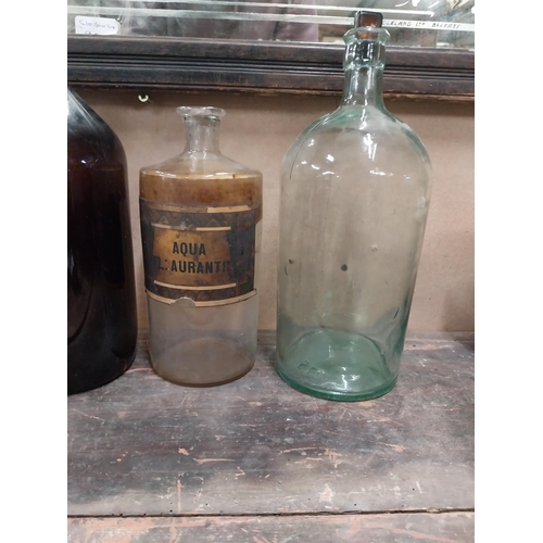 1306A - Miscellaneous lot of glass sweet jars, four chemist bottles, Coca Cola bottle and tobacco cutter. {2... 