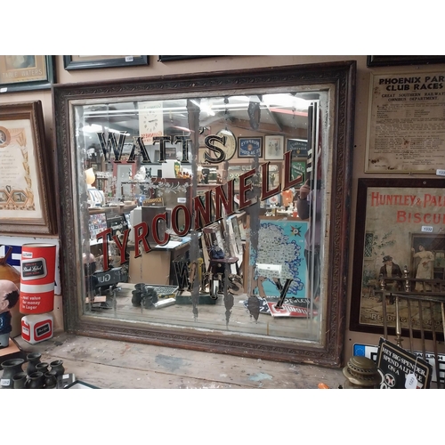 1308 - Early 1900's Watt's Tyrconnell Whisky mirror in original decorated frame. {125 cm H x 138 cm W}.