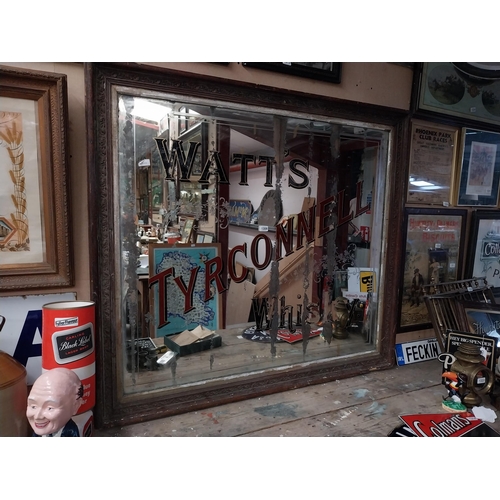 1308 - Early 1900's Watt's Tyrconnell Whisky mirror in original decorated frame. {125 cm H x 138 cm W}.