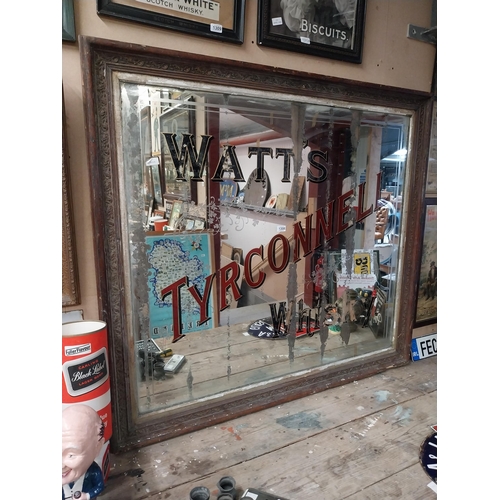 1308 - Early 1900's Watt's Tyrconnell Whisky mirror in original decorated frame. {125 cm H x 138 cm W}.