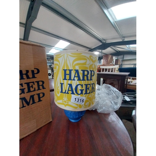 1316 - 1970's Harp Lager lamp in original box. { 25cm H X 16cm W }.