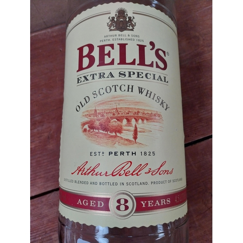 132 - Bell's Scotch Whiskey empty advertising bottle with original box. {50 cm H x 14 cm W  x 14 cm D}.