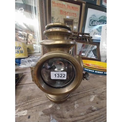 1322 - Early 20th C. brass motor car lamp. {27 cm H x 16 cm W x 13 cm W}.