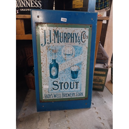 1329 - Tinplate JJ Murphy and Co's Stout advertising sign. {77 cm H x 46 cm W}.