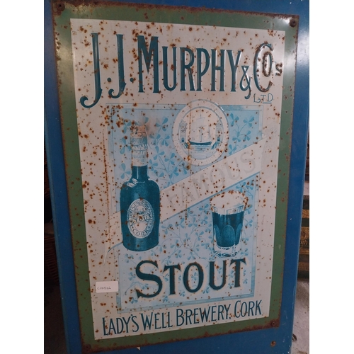 1329 - Tinplate JJ Murphy and Co's Stout advertising sign. {77 cm H x 46 cm W}.