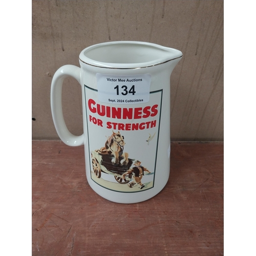 134 - Guinness for Strength ceramic water advertising jug. {22 cm H x 19 cm W x 16 cm D}.