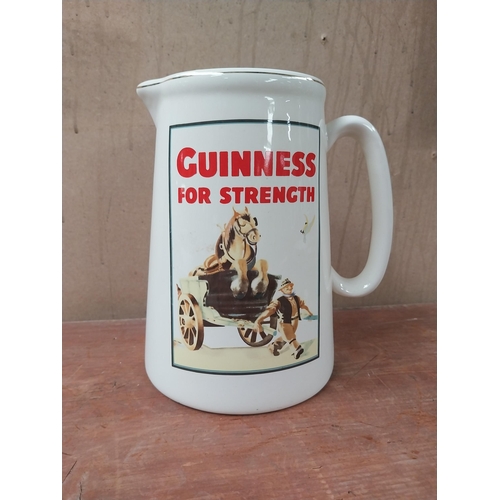 134 - Guinness for Strength ceramic water advertising jug. {22 cm H x 19 cm W x 16 cm D}.