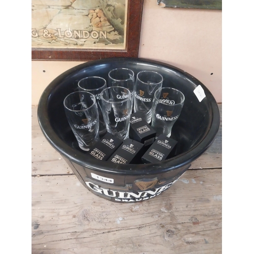 1344 - Guinness Ice Bucket with six Guinness glasses and three shot glasses in original boxes. {18 cm H x 3... 