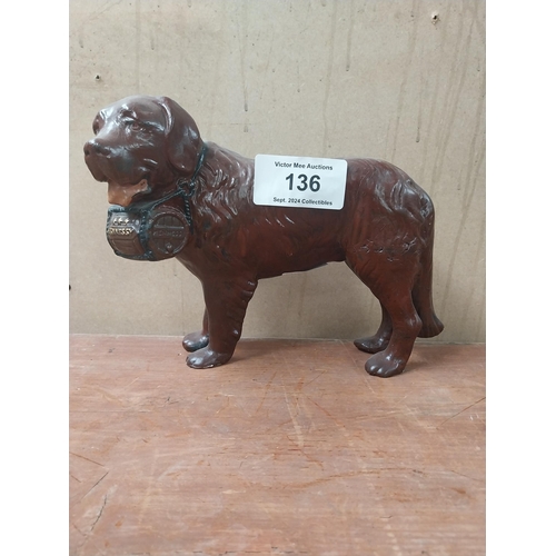 136 - Hennessey Cognac composition advertising Dog figure. {25 cm H x 20 cm W x 9 cm D}.