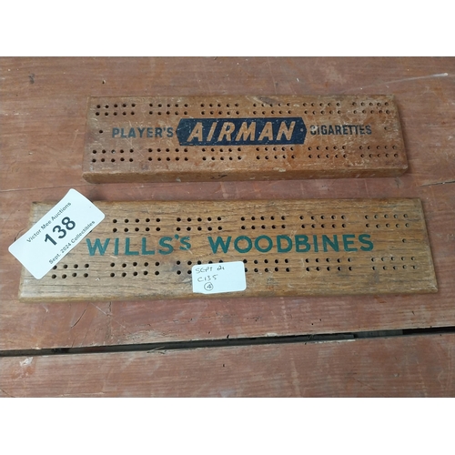 138 - Airman and Wills's Woodbine cribbage boards. {30 cm W x 8 cm D}.