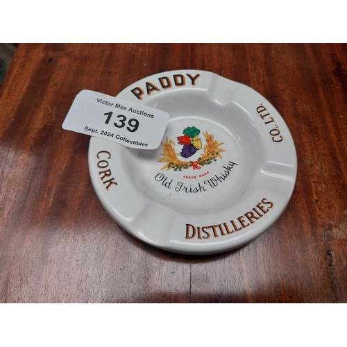 139 - Paddy Old Irish Whiskey ceramic advertising ashtray. {2 cm H x 13 cm Diam.}.