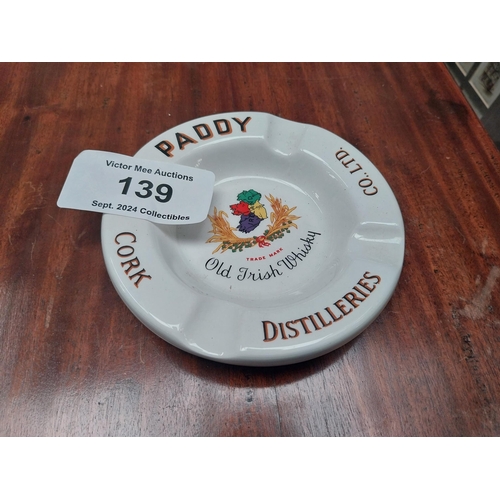 139 - Paddy Old Irish Whiskey ceramic advertising ashtray. {2 cm H x 13 cm Diam.}.