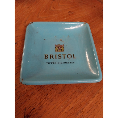 14 - Two enamel ashtrays  - Bristol Cigarettes and Woodbine Cigarettes. {13 cm H x 13 cm W}