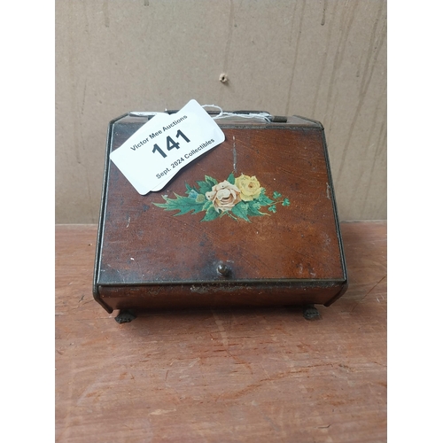 141 - Tin plate tea caddy in the form of a coal box. {11 cm H x 15 cm W x 14 cm D}