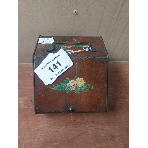 141 - Tin plate tea caddy in the form of a coal box. {11 cm H x 15 cm W x 14 cm D}