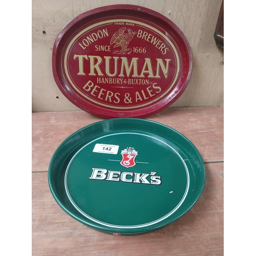 142 - Beck's Lager {33 cm Diam.} and Truman's Beer and Ale  {32 cm H x 41 cm W} tin plate advertising tray... 