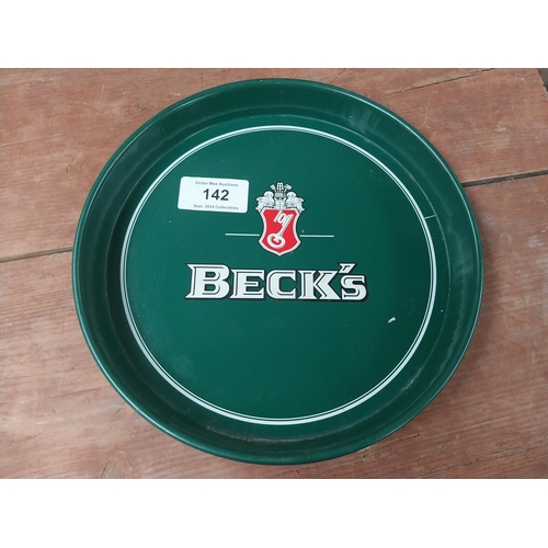 142 - Beck's Lager {33 cm Diam.} and Truman's Beer and Ale  {32 cm H x 41 cm W} tin plate advertising tray... 