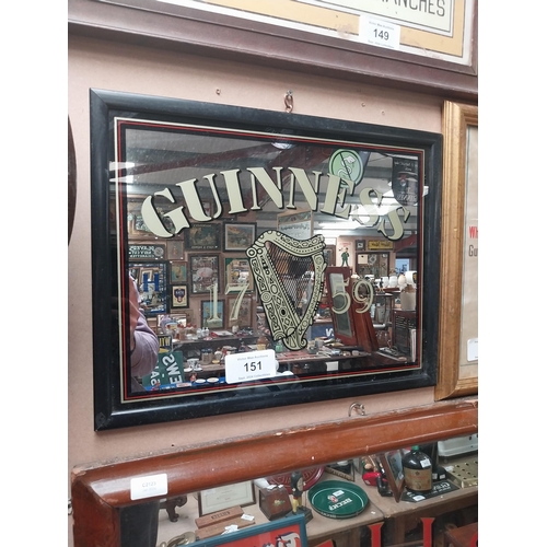 151 - Guinness advertising mirror in wooden frame. {37 cm H x 47 cm W}.