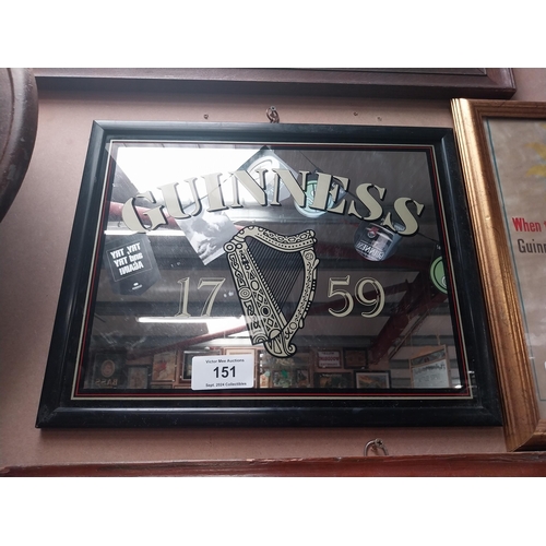 151 - Guinness advertising mirror in wooden frame. {37 cm H x 47 cm W}.