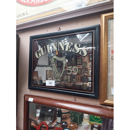 151 - Guinness advertising mirror in wooden frame. {37 cm H x 47 cm W}.