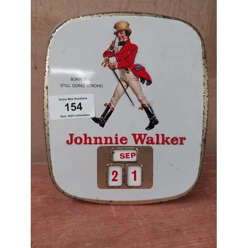 154 - Johnnie Walker Born 1820 - Still Going Strong tin plate advertising calender. {27cm H X 24cm W}.