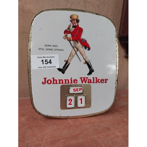 154 - Johnnie Walker Born 1820 - Still Going Strong tin plate advertising calender. {27cm H X 24cm W}.