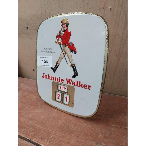 154 - Johnnie Walker Born 1820 - Still Going Strong tin plate advertising calender. {27cm H X 24cm W}.