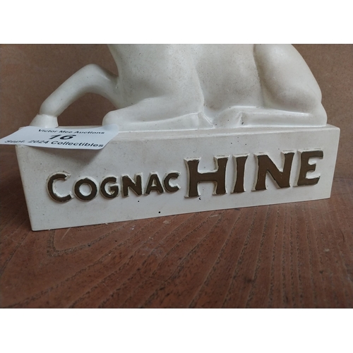 16 - Cognac Hine Ruberoid advertising figure. {25 cm H x 22 cm W x 6 cm D}.