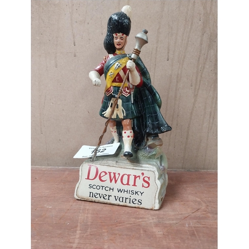 162 - Dewar's Scotch Whiskey Ruberoid advertising figure. {24 cm H x 11 cm W x 8 cm D}.