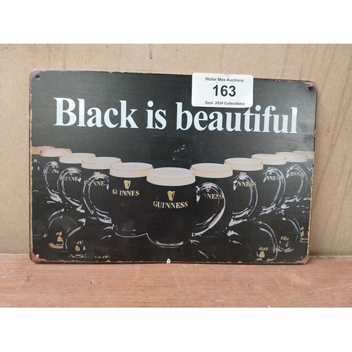 163 - Black is Beautiful Guinness tin plate advertising sign. {20 cm H x 30 cm W}.